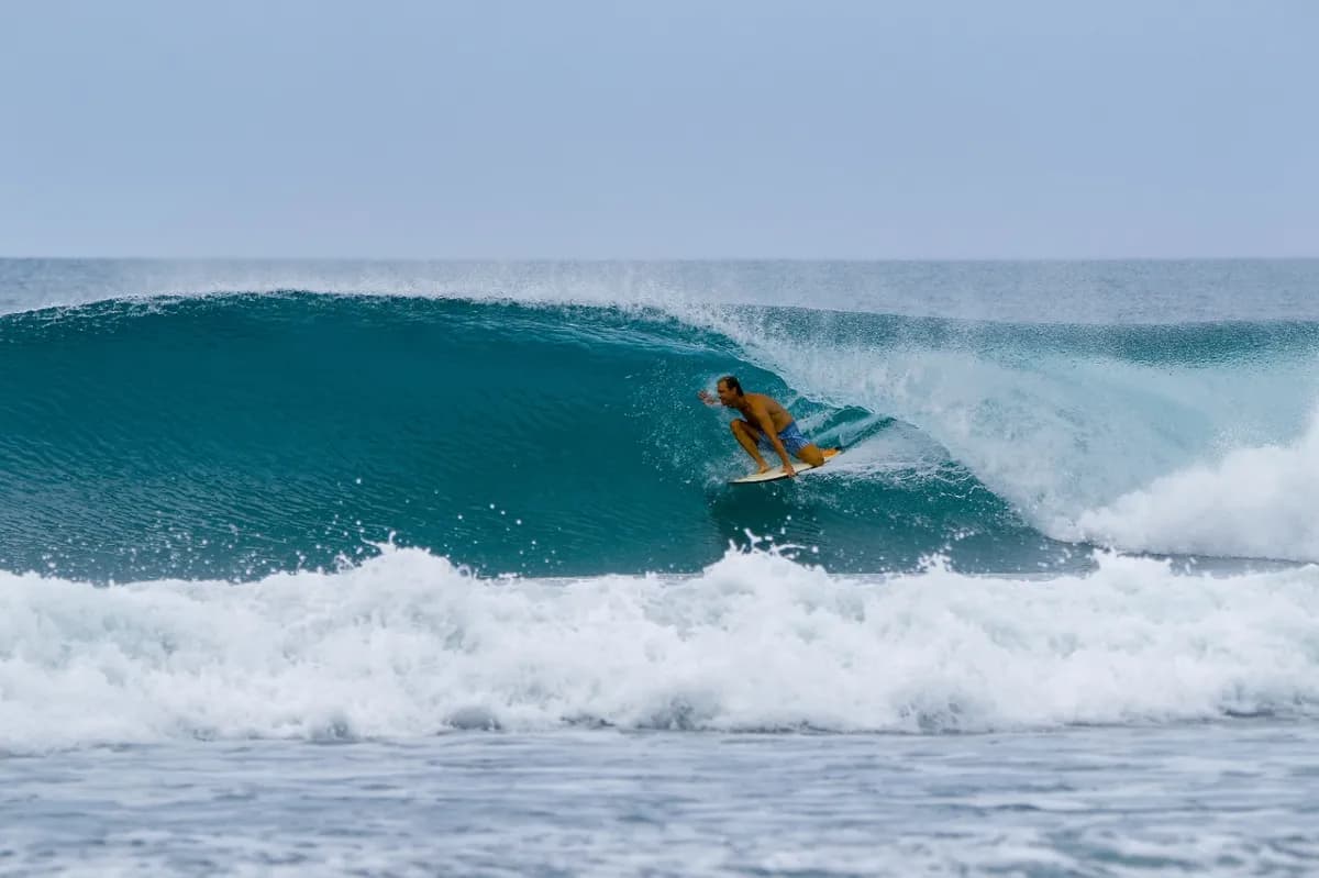 Carlos-Nsr tucked deep inside a stunning turquoise barrel.
