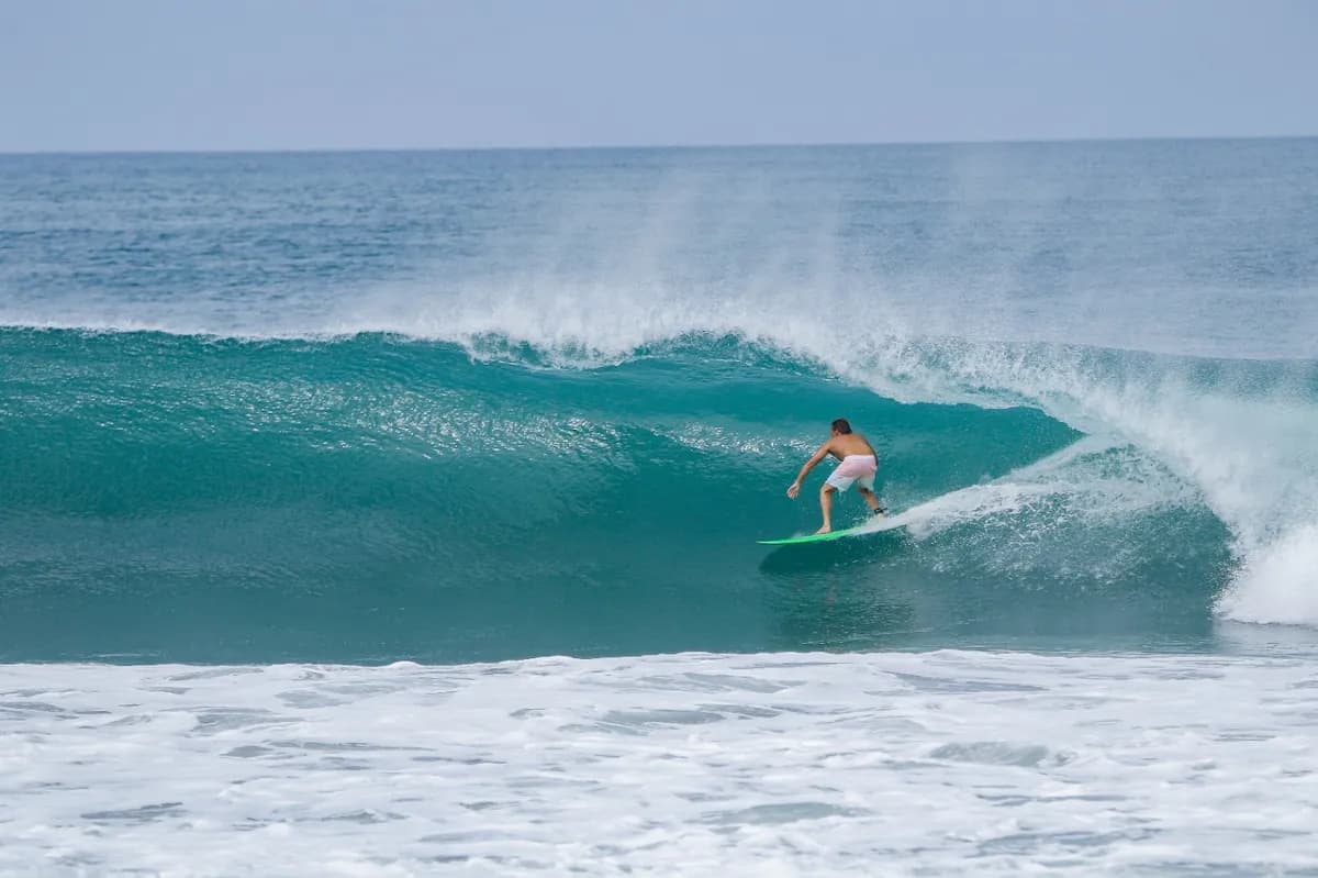 Surfer catches a perfect right barrel at Colorados.